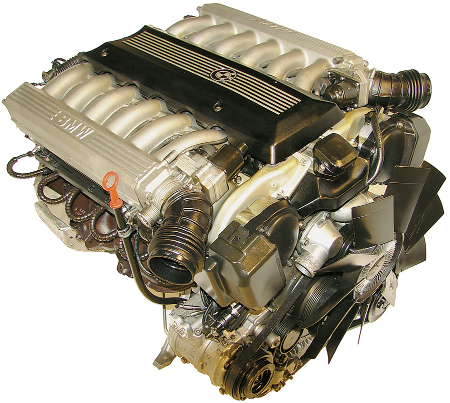 Бмв v16. Двигатель БМВ 6.6 v12. Мотор v12 БМВ е65. БМВ 7 v12 мотор. БМВ е38 в 12 мотор.